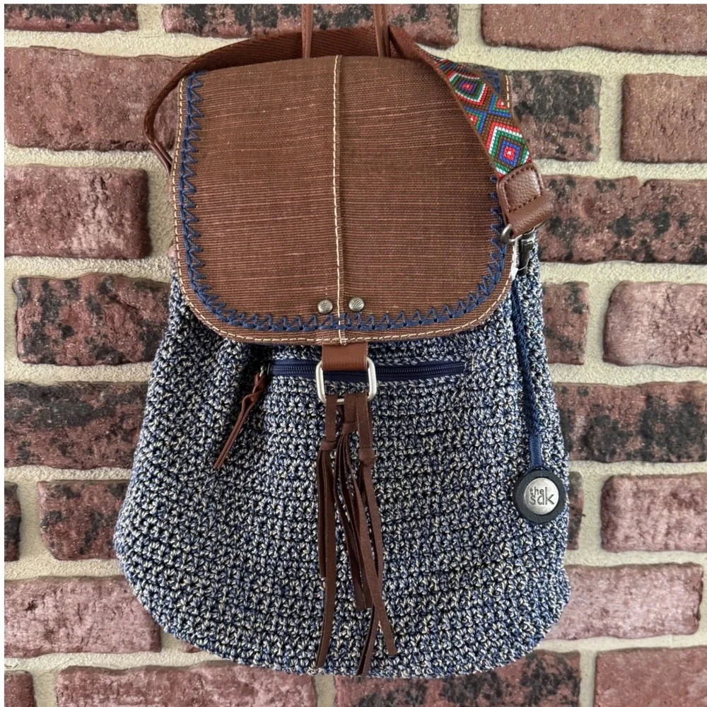 The Sak Brown & Navy Woven Backpack with Tassel Fringe and Embroidered Strap